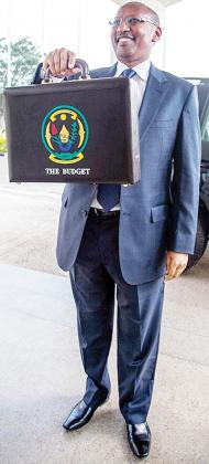 Finance and Economic Planning Minister, John Rwangombwa, on arrival at Parliament to present the National budget on Thursday.  The New Times / Robyn Spector. 