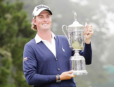 Webb Simpson poses with the championship trophy after the U.S. Open Championship golf tournament Sunday, June 17, 2012, at The Olympic Club in San Francisco. Net photo.