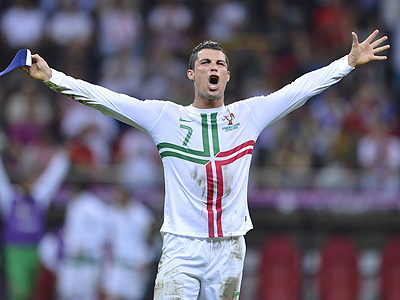 Cristiano Ronaldo roars with delight after his header books Portugal a place in the Euro 2012 semi-finals. Net photo.