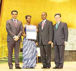 Sha Zukang, (L), Dr Mutlak Al-Qahtani, the representative of the President of the UN General Assembly (R), ACP Jimmy Hodari RNP attachu00e9 to the UN, and IP Goreth Mwenzangu (2nd L). The New Times / Courtesy.