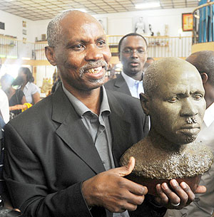 A local artisan a sculpture of himself. The New Times / J. Mbanda