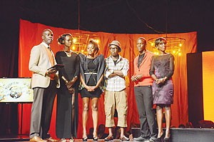 A cross section of contestants on stage with TPF 5 host Dr. Mitch Egwang. Courtesy photo.