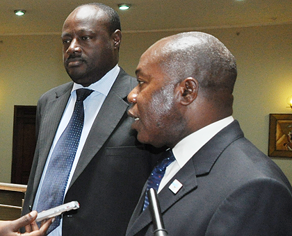 ICGLR Deputy Executive Secretary Amb.Vicente Muanda speaks to journalists in Kampala on Thursday. Looking on is his colleague Silas Sinyigaya. The New Times / Gashegu Muramira.