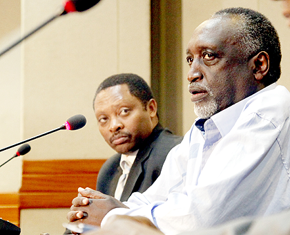 Senator Tito Rutaremara (R) and Prof. Anastase Shyaka addressing journalists at Telecom House. The New Times,,T. Kisambira.