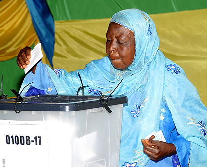 An elderly woman casting her vote. Elections are big business, according to Kagoro. The New Times / File.