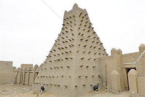 Al Qaeda-linked Mali Islamists armed with Kalashnikovs and pick-axes began destroying prized mausoleums of saints in the UNESCO -listed northern city of Timbuktu on June 30. Net photo