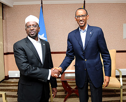 President Paul Kagame with Somali President Sheikh Shariff Ahmed who arrived in Rwanda yesterday for a working visit. The New Times / Urugwiro Village.