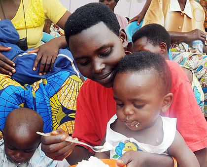 A woman feeding her child.Rwanda Red Cross has  launched a campaign against poor feeding in Burera district, Northern Province. File photo.