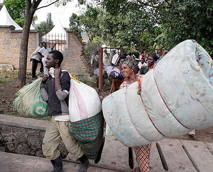 Refugees from DR congo ready to board a lorry to Nkamira transit camp. With continued conflict more refugees are expected. The New Times / T Kisambira.