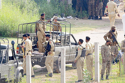 Pakistani soldiers gather after attack on an army camp in Wazirabad, some 180km southeast of Islamabad.  Net photo.