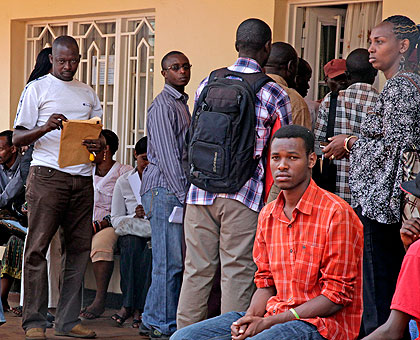 Some of the people waiting for their documents to be notarised at Kicukiro District. The New Times / Timothy Kisambira.