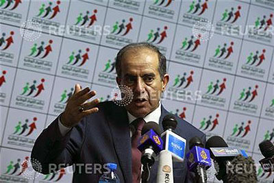 Mahmoud Jibril, head of the National Forces Alliance, talks during a news conference at his headquarters in Tripoli July 8, 2012.  Net photo.