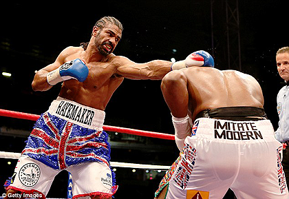 David Haye connects with a left jab at Upton Park on Saturday night. Net photo.