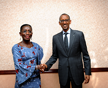 President Kagame shakes hands with Director of IMF-African Department, Antoinette Sayeh yesterday. The New Times / Timothy Kisambira.