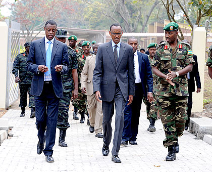 President Kagame, Defence minister Gen. James Kabarebe (L) and Chief of Defence Staff Lt. Gen. Charles Kayonga   tour  the RDF Command and Staff College  at Nyakinama  yesterday. The New Times / Village Urugwiro.