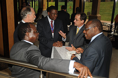 Seeking solutions. Experts chat during a recent meeting of African central bank governors in Kigali. The New Times / J. Mbanda.