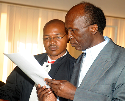 Leon Mugesera (R) with his former lawyer Mutunzi. The New Times / File