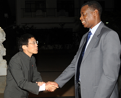 Defence Minister James Kabarebe being welcomed by Chinese Ambassador, Shu Zhan, during celebrations to mark the 85th anniversary of the establishment of the Chinese Peopleu2019s Liberation Army. The Sunday Times / John Mbanda.