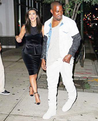 Kim and Kanye en route to the theatre.