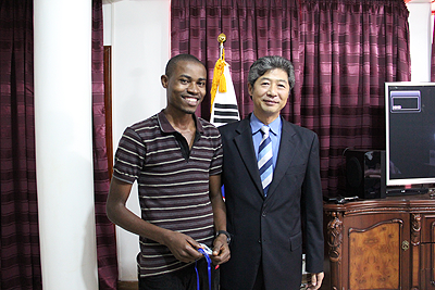 Jean Pierre Rutebuka and an official from the Korean Culture Centre. Courtesy