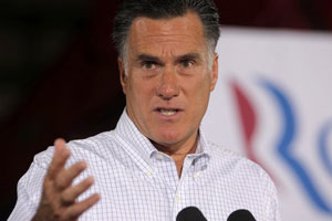 In this Aug. 3, 2012, photo, Republican presidential candidate, former Massachusetts Gov. Mitt Romney speaks to reporters after he campaigned at McCandless Trucking in North Las Vegas, Nev. Net photo.