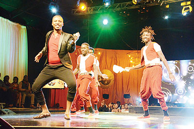 Jackson Kalimba (L) takes to the stage during TPF competition. The New Times / File.