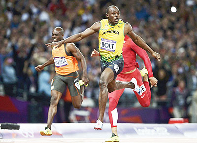 Lightning Bolt: The Jamaican set a new Olympic record after winning the 100m in a time of 9.63 seconds. Net photo.