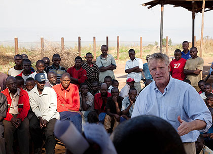 Chairman of NRD, Roderick Marshall ( L), addressing miners and district authorities. The New Times / T. Kisambira