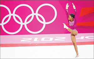 Gabby Douglas of the U.S. won the individual gold medal in the all-around gymnastics competition on Aug. 2, becoming the first African-American Olympic all-around champion. Net photo.