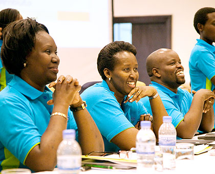 The First Lady, Jeannette Kagame (C) together with Diana Ofwona, UN Women Regional Director (L), and  the Minister of Youth and ICT, Jean Philbert Nsengimana, during the Youth Forum in Kigali, yesterday. The New Times / Timothy Kisambira.