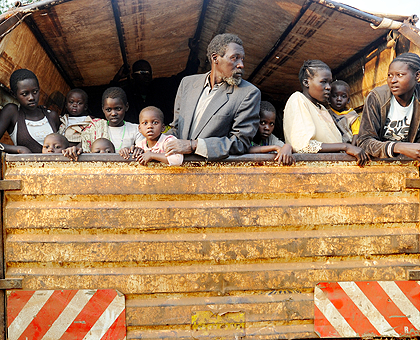 A family on arrival from Uganda at Gatuna border recently. The New Times / File.