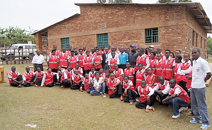 Trainees pose for a group photo at the closing day of the training. The Sunday Times / Grace Mugoya.