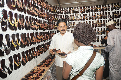 A foreign exhibitor talks to a client at the just concluded Expo.  The New Times / File.