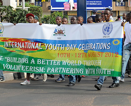 Youth march to celebrate International Youth Day yesterday. The New Times / John Mbanda.