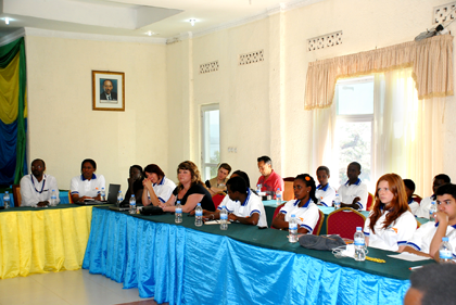 A cross section of participants  listen attentively during the presentations. The New Times / Grace Mugoya.