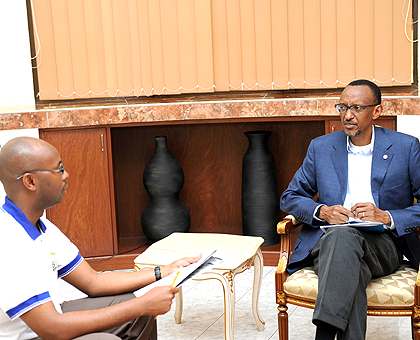 President Paul Kagame responding to questions from NISR Director General Yusuf Murangwa at State House in Kiyovu, yesterday, as the fourth National Census kicked off.The New Times/ Village Urugwiro. 