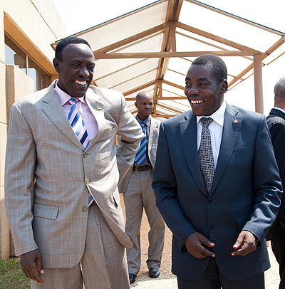 Senate President Dr. Ntawukuriryayo Jean Damascene (L) chats with his counterpart from Burundiu2019s Gabriel Ndizeye. The New Times / Timothy Kisambira.