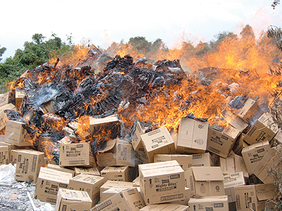 Contraband items sneaked into the country are set alight by authorities: The new body would curb against the entry of substabndard goods. The New Times / File.