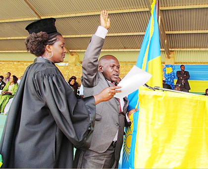 The newly elected Mayor Alexandre Mvuyekure taking his oath The New Times/Sam Nkurunziza.