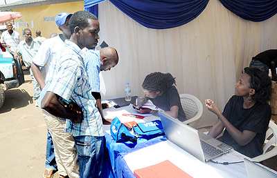 A financial literacy campaign at Remera Bus terminal yesterday. The New Times/John Mbanda.