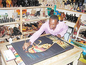 Kenyan artist at work. Net photo.