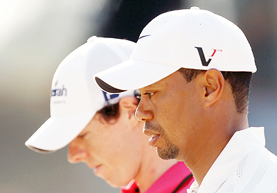 Rivals Rory McIlroy and Tiger Woods. Net photo.