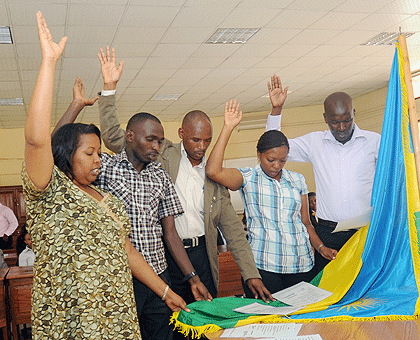 Court bailiffs take oath yesterday. The New Times / John Mbanda.