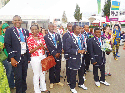 Team Rwanda delegation assemble at the Athleteu2019s Village on Sunday ahead of the London Paralympic Games 2012. The New Times/Pascal Bakomere.