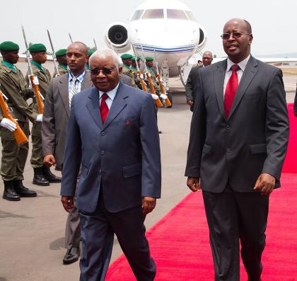 Mozambican President Armando Guebuza on arrival at Kigali International Airport today, where he was received by the Minister of Local Government James Musoni (R). The New Times Timothy Kisambira