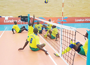 Rwandau2019s men sitting volleyball team in training in London. The team plays favourites Iran today.  The New Times/Courtesy.