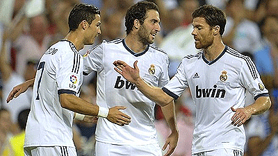 Madrid's Cristiano Ronaldo takes the congratulations after scoring the second against Barcelona. Net photo.