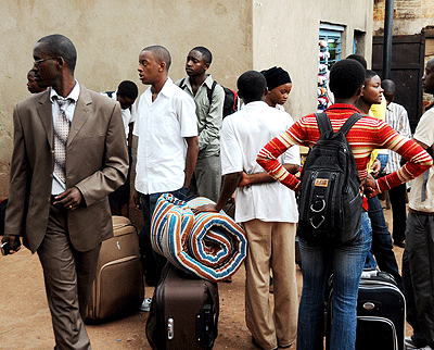 Students in Nyabugogo Taxi Park going back to school. The New Times / Timothy Kisambira.