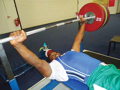 Thu00e9ogu00e8ne Hakizimana trying his luck in the Menu2019s 82.50kg at Excel yesterday. The New Times/Pascal Bakomere.