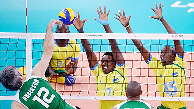 Rwandau2019s sitting volleyball team (on block), seen here in action against Brazil, lost all four matches at the 2012 Paralympic Games. The New Times/Pascal Bakomere.